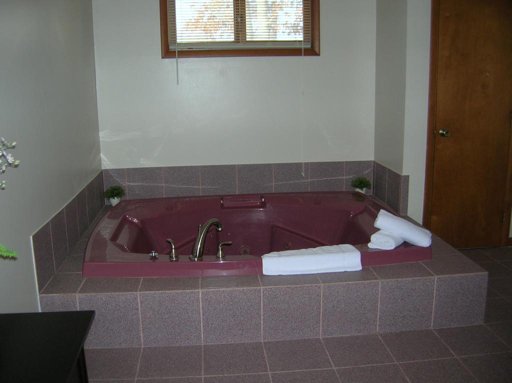 Camp Inn Lodge Oscoda Rom bilde