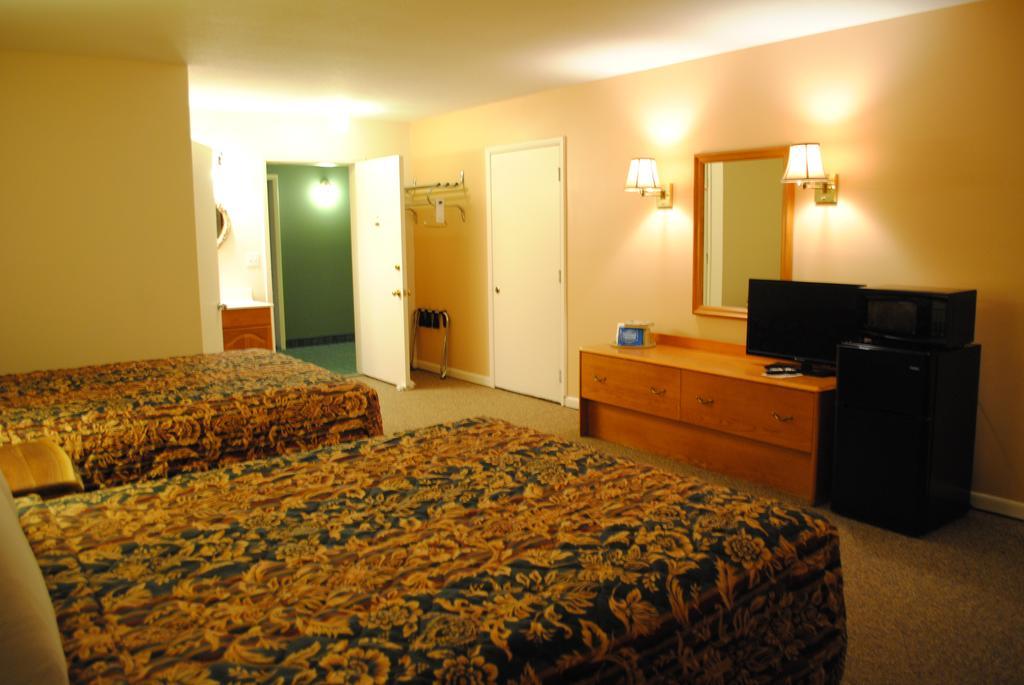 Camp Inn Lodge Oscoda Rom bilde